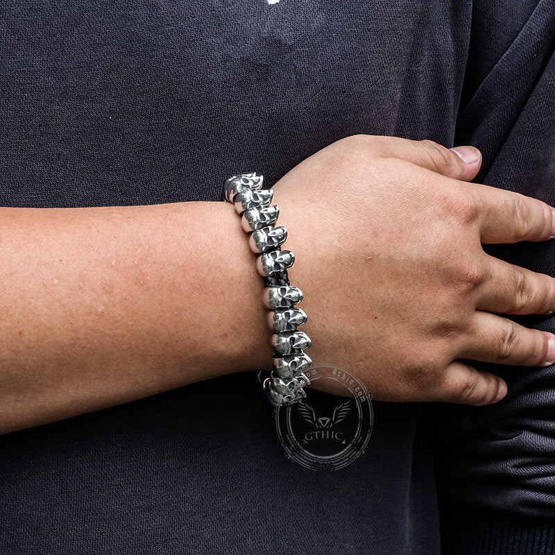 11265-surrounded-skulls-stainless-steel-bracelet-2.jpg Surrounded Skulls Stainless Steel Bracelet