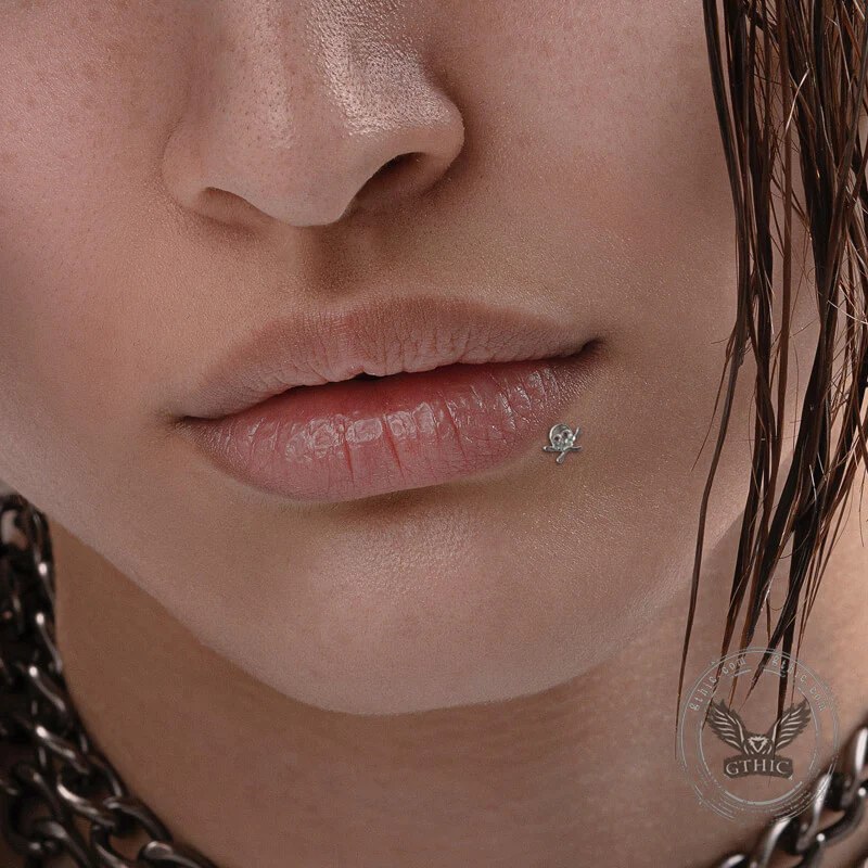 20206-16g-crossbones-skull-titanium-piercing-lip-ring-2.webp 16G Crossbones Skull Titanium Piercing Lip Ring
